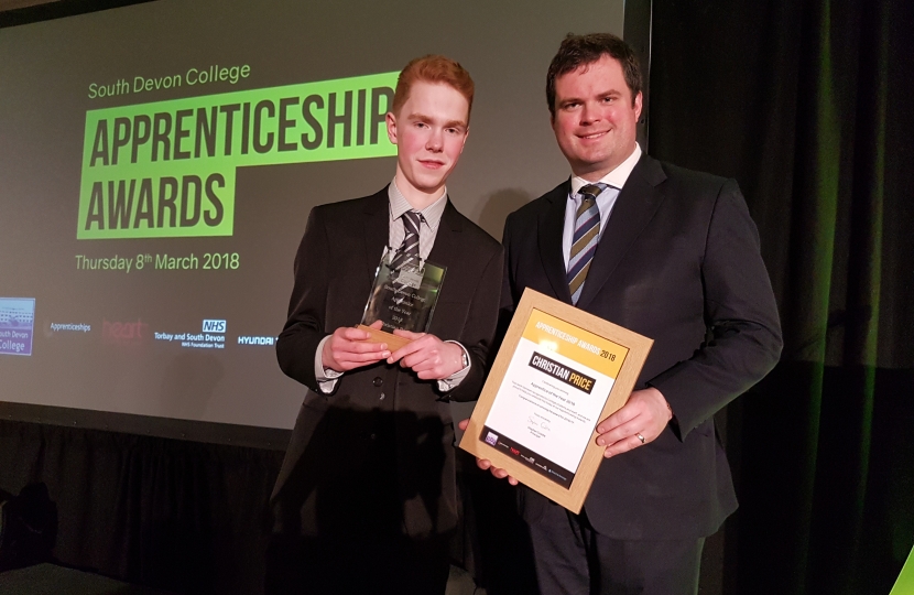 Kevin Presents Christian Price with the Apprentice of The Year Award.
