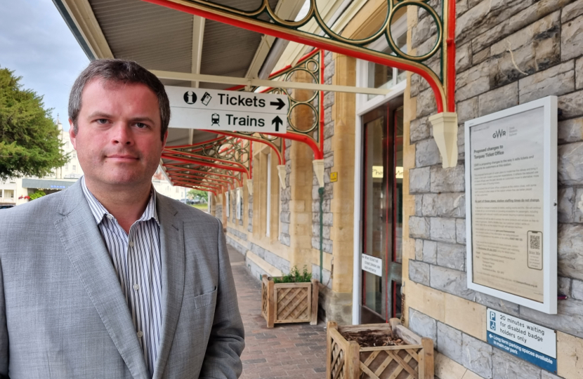 Kevin Foster MP outside Torquay Station's Ticket Office.