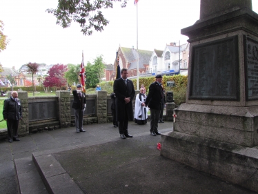 Observing the 2 minute silence at Paignton War Memorial.