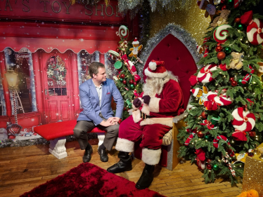 Kevin talking with "Father Christmas" at the Rotary Grotto in Fleet Walk.